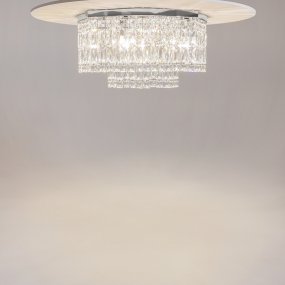 Dune Ø45 Chrome cristal De Maytoni - Les prismes étincelants capturent la lumière et créent une atmosphère luxueuse dans la pièce.