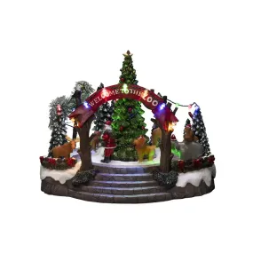 Décoration De Noël Mécanique Avec Zoo 20cm Multicolore De Konstsmide - Cette d&eacute;coration de No&euml;l m&eacute;canique pr&eacute;sente une sc&egrave;ne color&eacute;e avec 19 lumi&egrave;res LED blanches chaudes, de la musique, des animaux et le P&egrave;re No&euml;l autour d'un sapin de No&euml;l &eacute;tincelant.