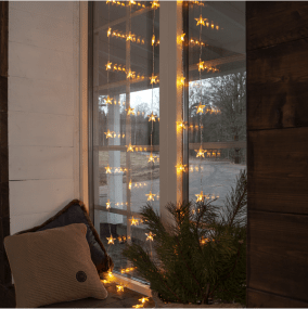 Rideau Lumineux Star 2m Transparent De Star Trading - Placez le rideau comme une belle d&eacute;coration avec une belle lumi&egrave;re dans la fen&ecirc;tre.