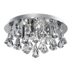 Hanna Ø35 Chrome cristal De Searchlight - Orné de prismes scintillants en forme de diamant, il reflète la lumière de manière enchanteresse, créant une atmosphère glamour et chaleureuse.