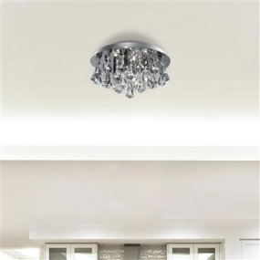 Hanna Ø35 Chrome cristal De Searchlight - Orné de prismes scintillants en forme de diamant, il reflète la lumière de manière enchanteresse, créant une atmosphère glamour et chaleureuse.