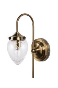 Juni 24cm Laiton antique/transparent lampe de salle de bain De Globen Lighting - Juni, avec son magnifique abat-jour en verre taillé et en métal, vous transporte au début du XXe siècle.