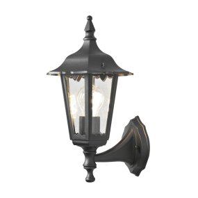Firenze Noir De Konstsmide - Le design élégant et la lumière chaleureuse de la lampe créent une atmosphère accueillante, parfaite pour les entrées et les patios.
