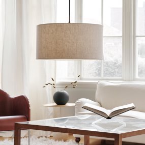 Soft Ø60 Nature/bronze De Belid - La suspension en m&eacute;tal couleur bronze apporte une touche d'&eacute;l&eacute;gance et s'harmonise parfaitement avec le tissu.