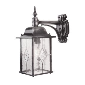Wexford Argent lampe d’extérieur De Elstead Lighting - Wexford est une applique murale d'extérieur classique en aluminium, avec une élégante finition argent foncé et des éléments décoratifs en verre texturé façon vitrail.