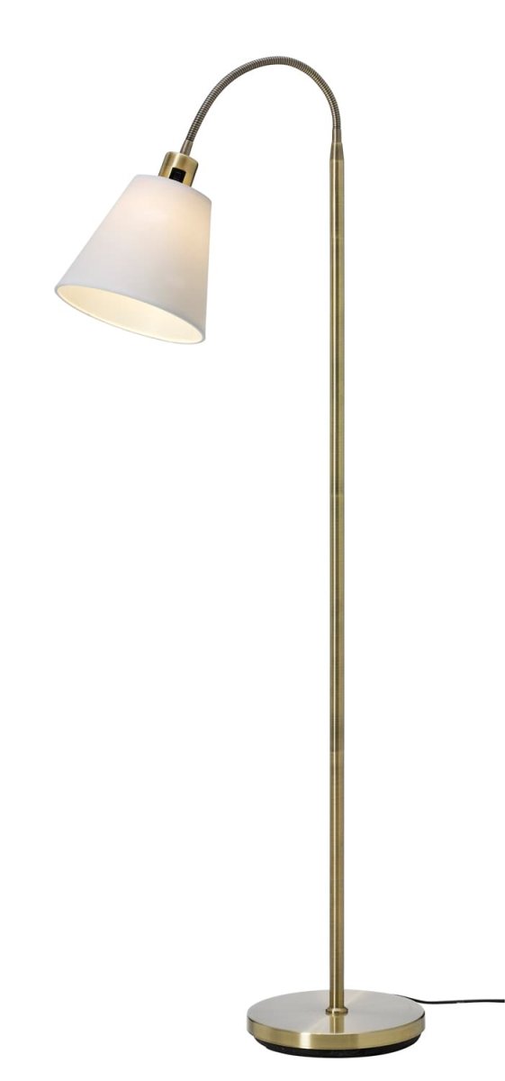Solo Laiton antique lampadaire De Cottex - Le lampadaire Solo en laiton antique est disponible avec des abat-jour en textile blanc et noir pour un style personnel.