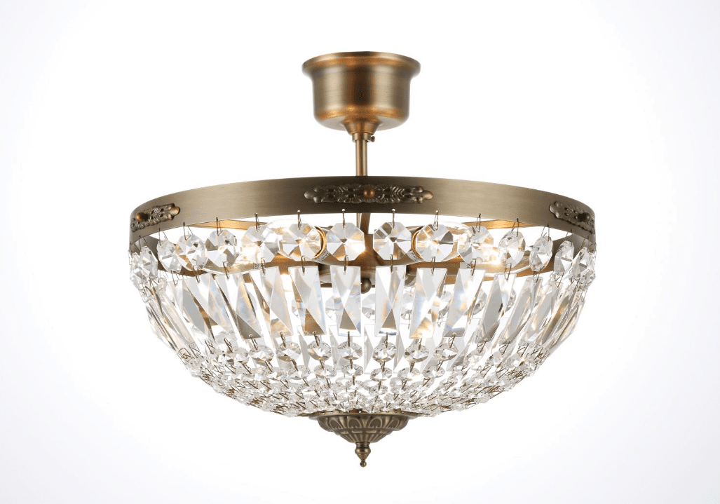 Rhea Ø40 Laiton antique cristal De Norrsken Design - Rhea Antique Brass est un plafonnier exclusif décoré de prismes en cristal K9 de classe 1 taillé à la main, donnant à la pièce un style élégant et intemporel.