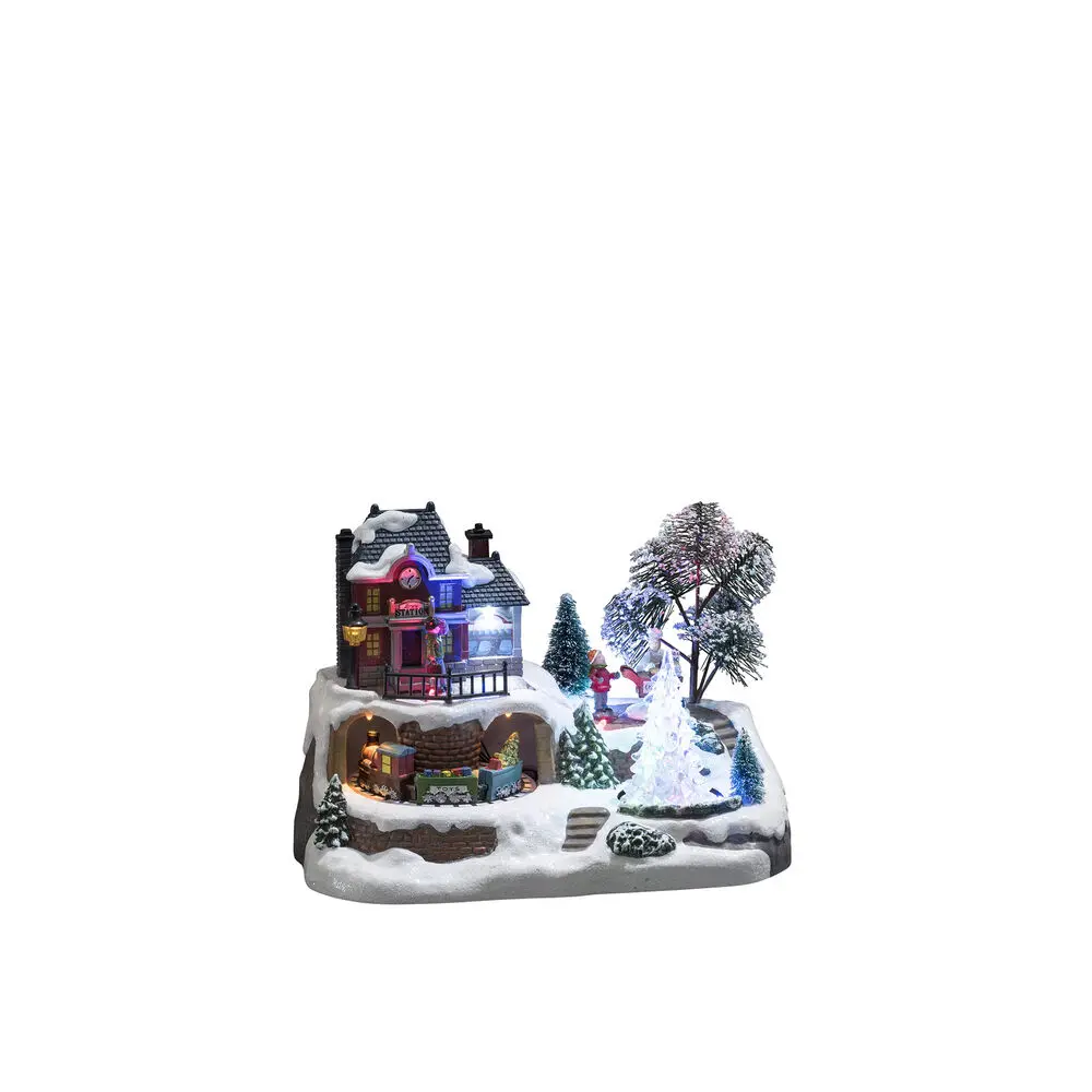Décoration De Noël Mécanique Avec Gare 17cm Multicolore De Konstsmide - Des lumi&egrave;res LED lumineuses et de la musique int&eacute;gr&eacute;e cr&eacute;ent une merveilleuse atmosph&egrave;re de No&euml;l tandis que le train fait le tour des d&eacute;corations.