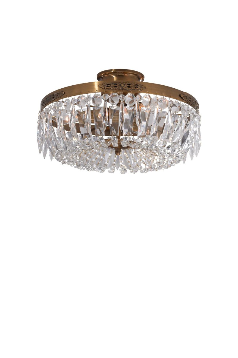 Strömsholm Ø35 Antique cristal De Markslöjd - Ce plafonnier classique en m&eacute;tal de couleur antique pr&eacute;sente de magnifiques prismes d&eacute;coup&eacute;s &agrave; la machine qui conf&egrave;rent &agrave; la pi&egrave;ce une atmosph&egrave;re &eacute;l&eacute;gante et luxueuse.