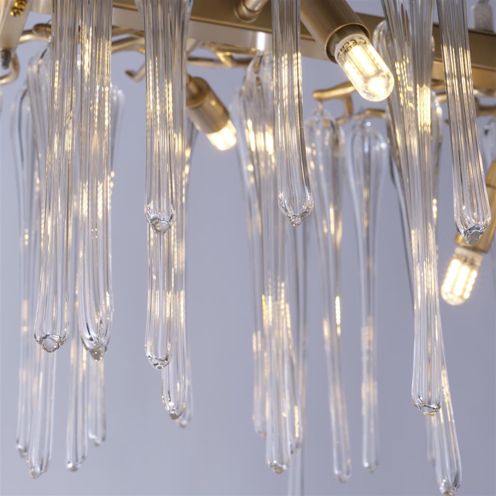 Heritage 117cm Or cristal De Searchlight - Les éléments en verre, longs et fins, créent un effet scintillant et vibrant qui confère à la pièce dynamisme et raffinement.