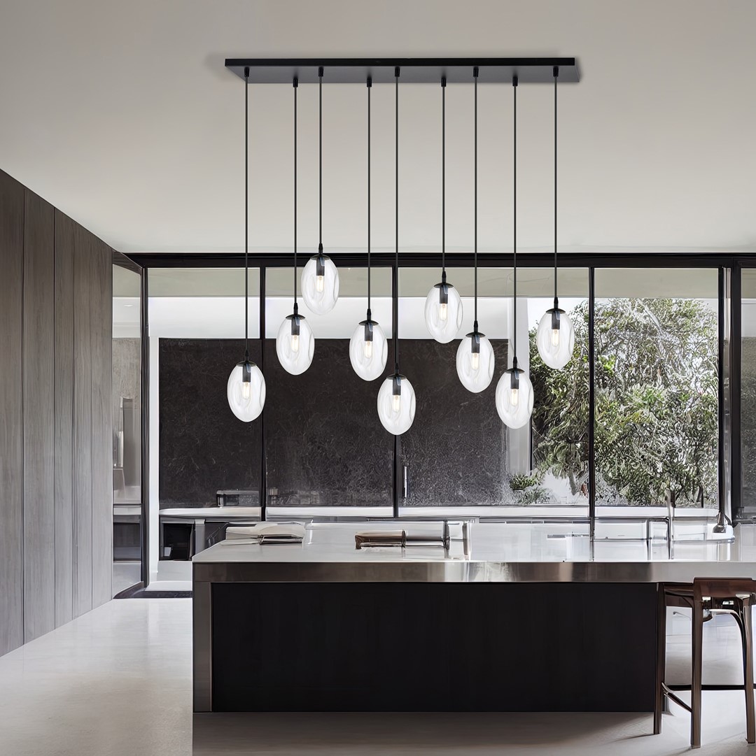 Astral 100cm Transparent suspension De Emibig Lighting - Elle est idéale au-dessus d'une table à manger ou dans un espace ouvert, où elle s'intègre harmonieusement à son environnement et devient un point focal naturel.
