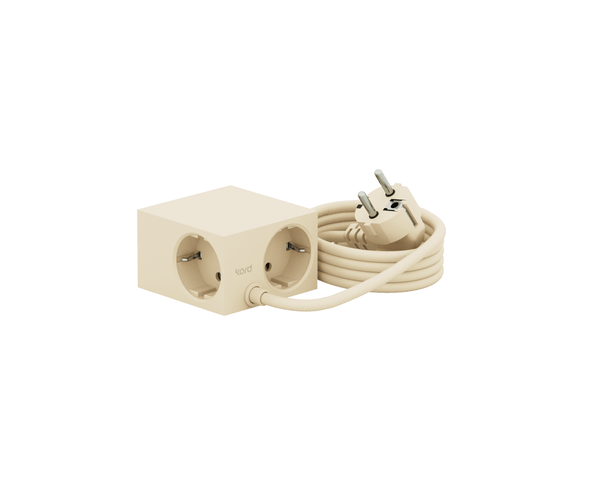 Cuboid Ivoire nacré De Kord - Plusieurs options de fixation&nbsp;: fixez la prise directement sur des surfaces m&eacute;talliques gr&acirc;ce aux c&ocirc;t&eacute;s magn&eacute;tiques, utilisez le support fourni avec surface de friction pour une fixation stable sur la table, ou fixez-la au mur avec du ruban adh&eacute;sif 3M pour une prise discr&egrave;te et facilement accessible.