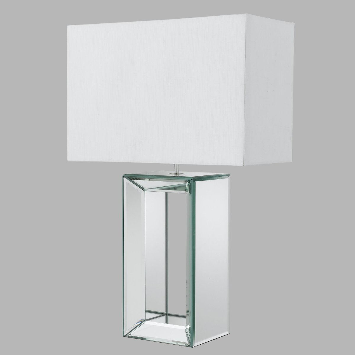 Mirror 58cm Blanc lampe de table De Searchlight - La base en miroir donne à la lampe un aspect moderne et la rend parfaite pour être placée dans un salon moderne, où elle offre à la fois lumière et style.