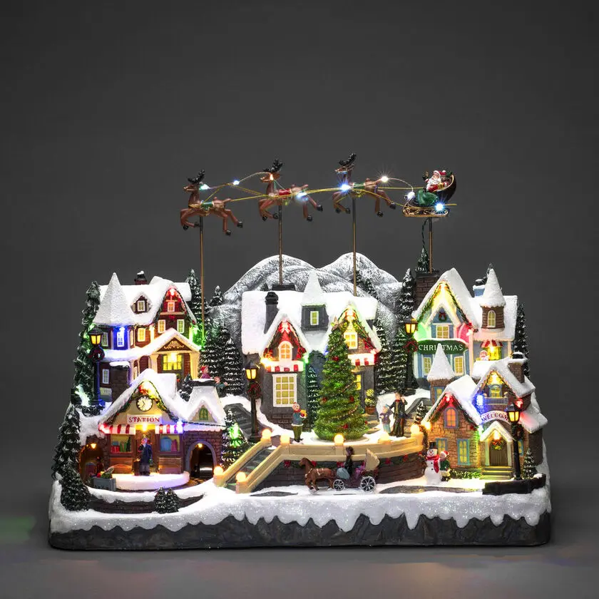 Décoration De Noël Mécanique Avec Village Et Train 40cm Multicolore De Konstsmide - Un monde de No&euml;l complet, plein de vie, de lumi&egrave;re et de mouvement.