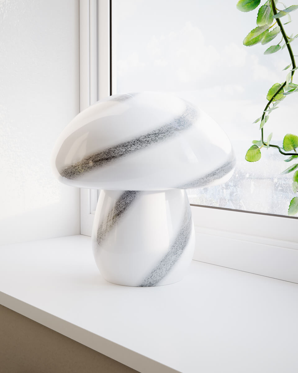 Mira Mushroom 30cm Blanc/noir lampe de table De By Rydéns - La lampe n'est pas seulement une source de lumi&egrave;re fonctionnelle mais aussi un d&eacute;tail artistique qui met en valeur votre int&eacute;rieur avec son design inspir&eacute; de la nature et sa qualit&eacute; artisanale.