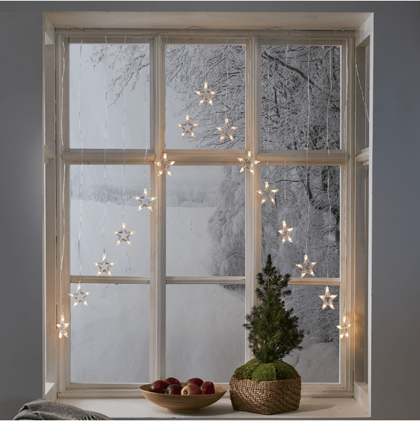 Rideau Lumineux DecyStar 1,2m Transparent De Star Trading - Belle d&eacute;coration de fen&ecirc;tre avec une &eacute;toile en bas.