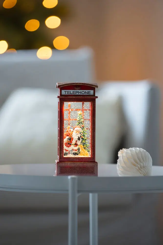 Lanterne Remplie D'eau Avec cabine téléphonique ROUGE De Konstsmide - Mini lanterne d&eacute;corative remplie d'eau en forme de cabine t&eacute;l&eacute;phonique rouge classique avec un motif de No&euml;l.