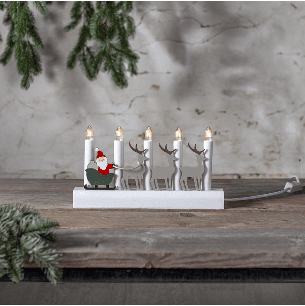 Julia Blanc De Star Trading - Bougeoir de l'Avent avec le P&egrave;re No&euml;l et ses rennes, peints aux couleurs de No&euml;l.
