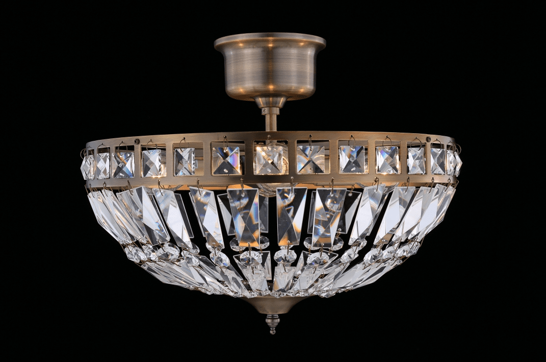 Flores Ø35 Laiton antique cristal De Norrsken Design - Le plafonnier Flores en laiton antique est une source de lumière élégante et sophistiquée qui met en valeur n'importe quelle pièce avec son design moderne et ses détails exclusifs.