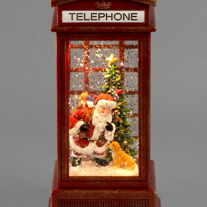 Lanterne Remplie D'eau Avec cabine téléphonique ROUGE De Konstsmide - Mini lanterne d&eacute;corative remplie d'eau en forme de cabine t&eacute;l&eacute;phonique rouge classique avec un motif de No&euml;l.