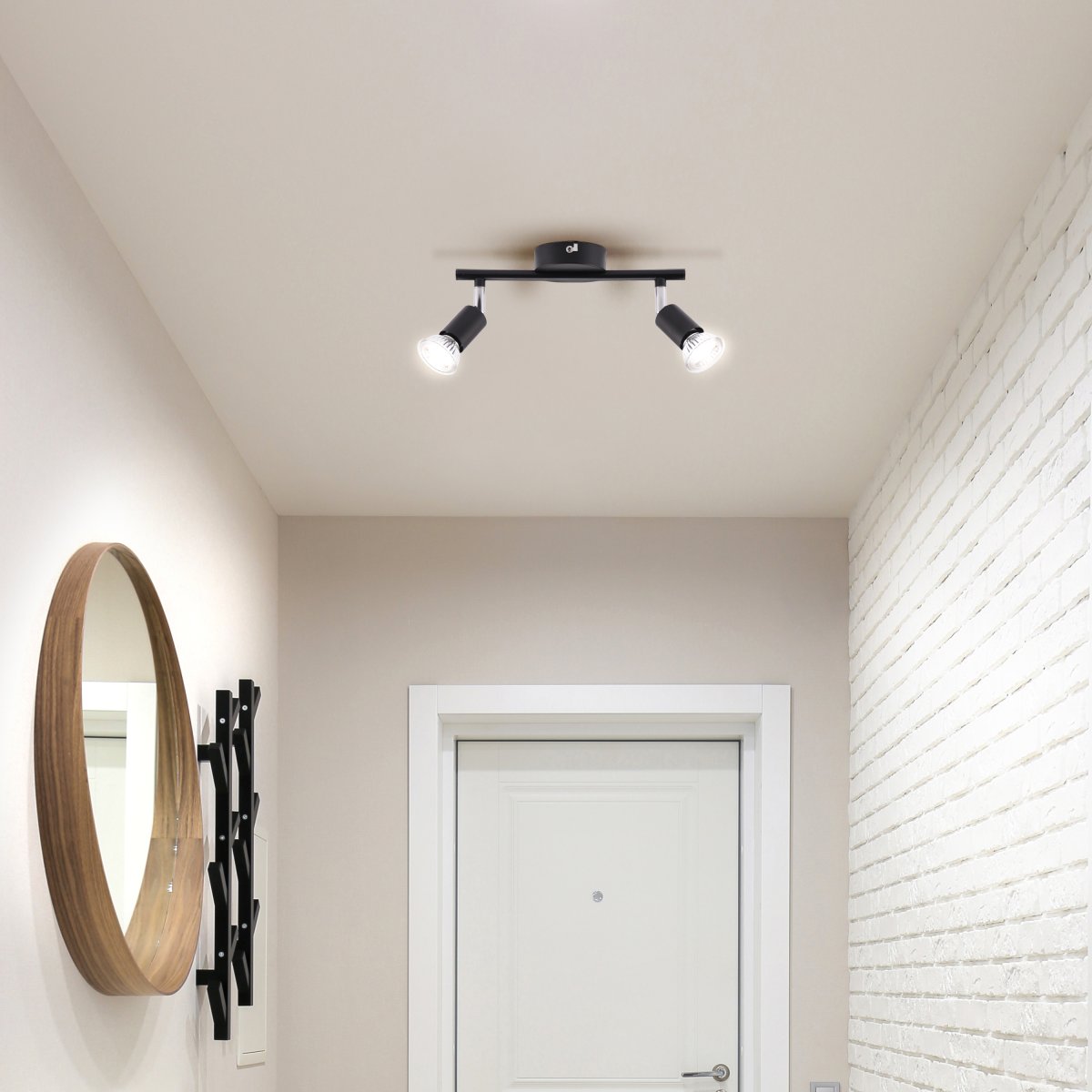 Prato 2 Noir mat spot De Brilliant - La lampe est en métal et présente un design élégant qui s'intègre bien dans les intérieurs modernes.