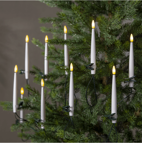 Flamme 16LED Vert De Star Trading - Elle est fournie avec un c&acirc;ble vert et un compartiment &agrave; piles pour une utilisation en int&eacute;rieur.