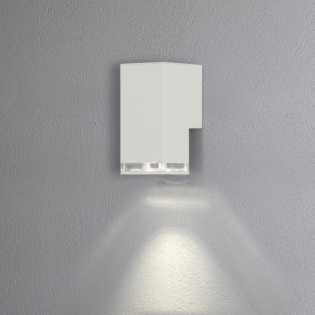 Pollux Blanc lampe d’extérieur De Konstsmide - La lampe dirige la lumière vers le bas et crée une lueur douce et agréable qui offre sécurité et élégance dans les espaces extérieurs.