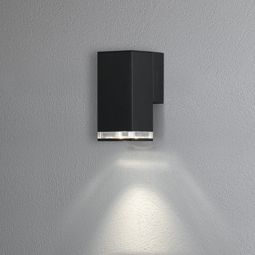Pollux Noir lampe d’extérieur De Konstsmide - La lampe dirige la lumière vers le bas et crée une lueur douce et agréable qui offre sécurité et élégance dans les espaces extérieurs.