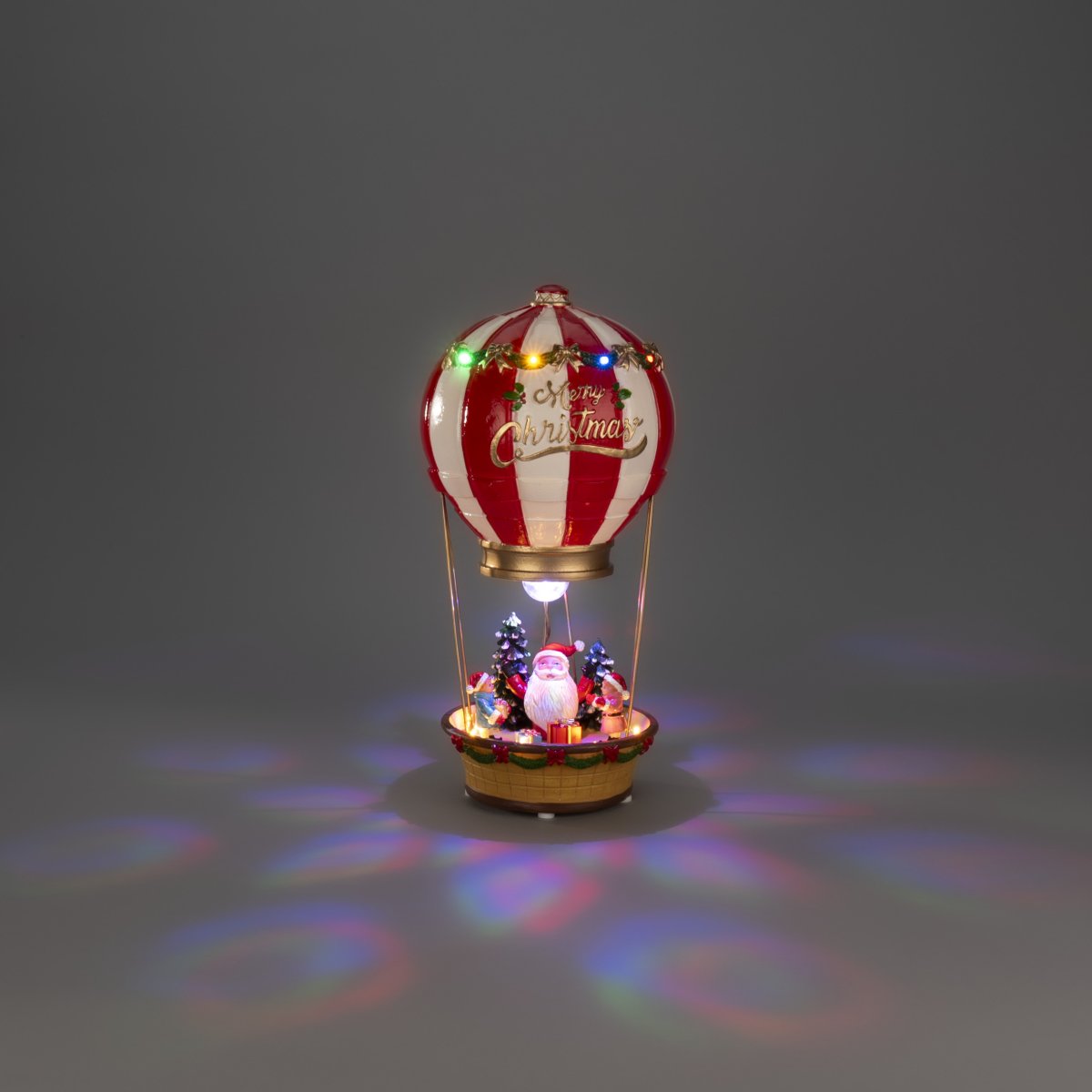 Père Noël en montgolfière 32cm Multicolore De Konstsmide - Cr&eacute;ez une ambiance de No&euml;l f&eacute;&eacute;rique et color&eacute;e avec ce P&egrave;re No&euml;l en montgolfi&egrave;re.
