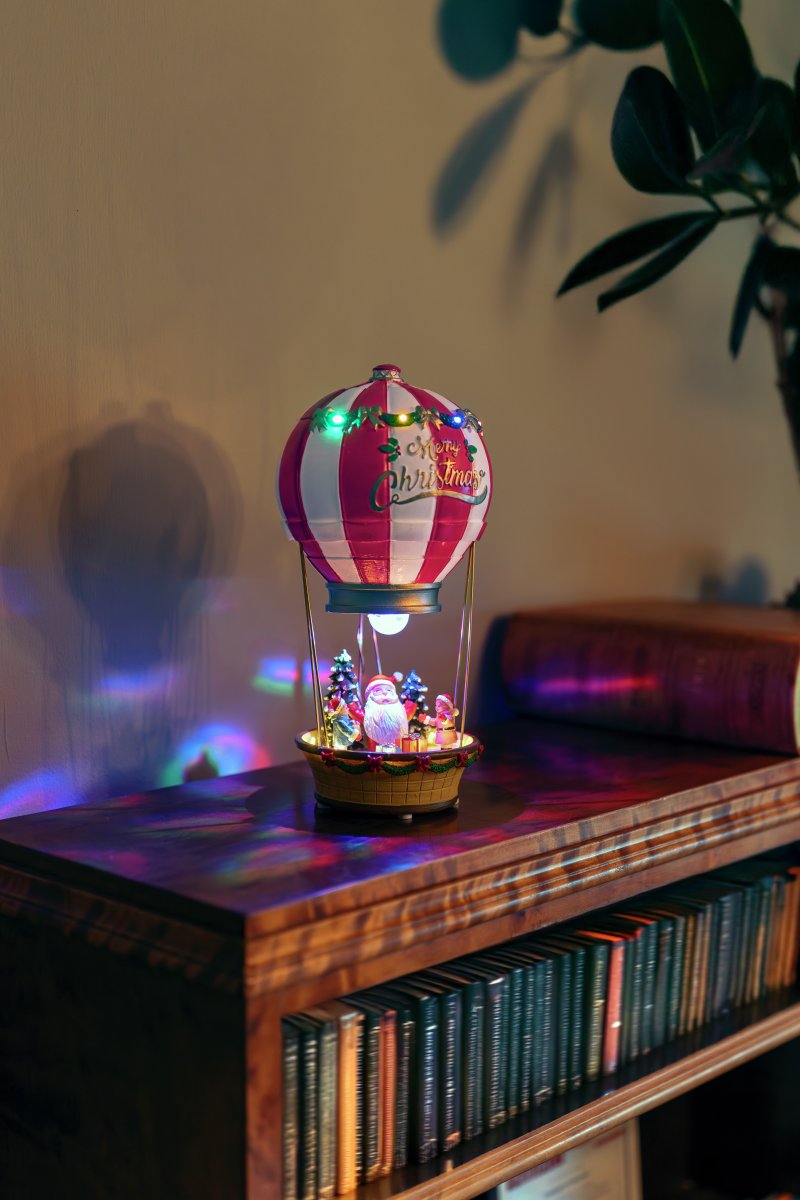 Père Noël en montgolfière 32cm Multicolore De Konstsmide - Cr&eacute;ez une ambiance de No&euml;l f&eacute;&eacute;rique et color&eacute;e avec ce P&egrave;re No&euml;l en montgolfi&egrave;re.