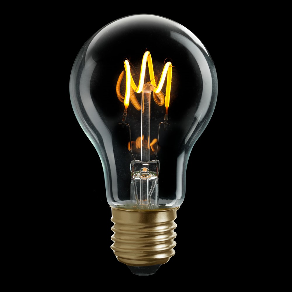 E27 normal 3W 2200K Dimmable Transparent De Unison - La source lumineuse standard, claire et dimmable E27 d'UNI-FLEX avec une puissance de 3 W et une lumi&egrave;re chaude de 2200 K fournit un &eacute;clairage &eacute;l&eacute;gant et agr&eacute;able.