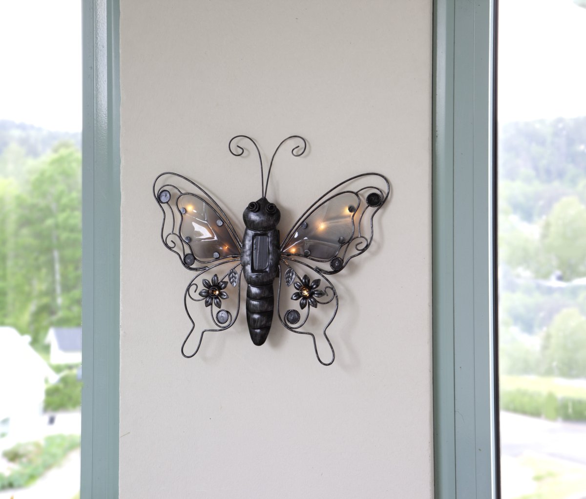 Butterfly Noir lampe solaire De Star Trading - La lampe solaire papillon est une applique murale décorative en forme de papillon.