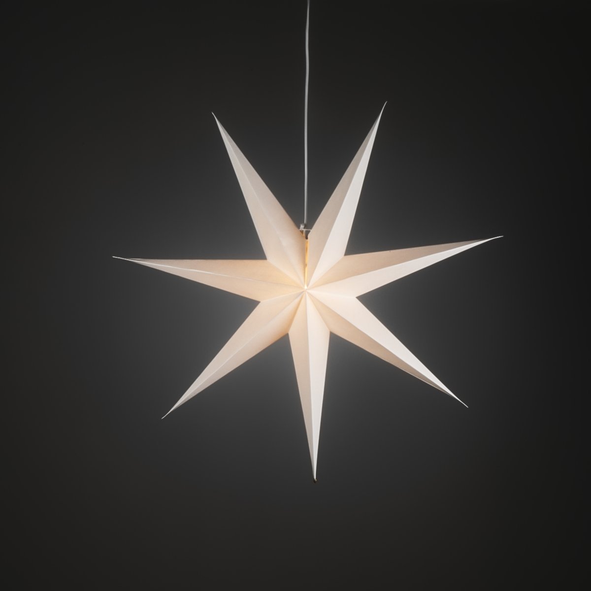 Étoile En Papier Ø78 Blanc De Konstsmide - Son design simple et raffin&eacute; diffuse une lumi&egrave;re douce et agr&eacute;able, cr&eacute;ant une atmosph&egrave;re harmonieuse pendant l'Avent et No&euml;l.