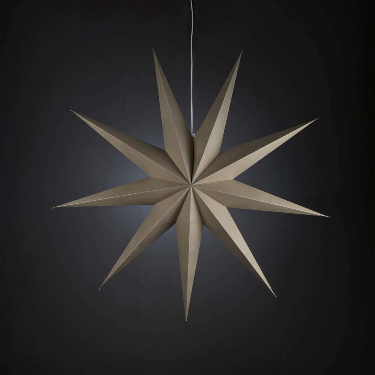 Étoile en papier Ø115 Beige De Konstsmide - Son design simple et &eacute;l&eacute;gant diffuse une lumi&egrave;re douce et agr&eacute;able, cr&eacute;ant une atmosph&egrave;re harmonieuse pendant l'Avent et No&euml;l.