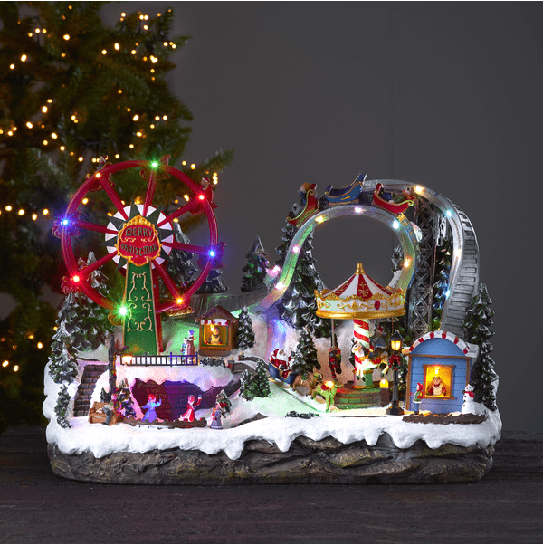 Largeville 36cm Multicolore De Star Trading - Grand village d&eacute;coratif et d&eacute;taill&eacute; en forme de f&ecirc;te foraine avec patinoire, carrousels et vall&eacute;e de montagne.