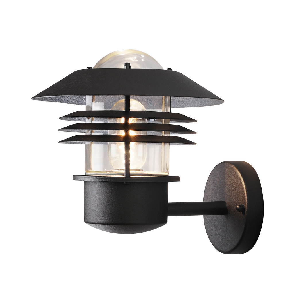 Modena Noir lampe d’extérieur De Konstsmide - Avec son toit protecteur et son design élégant, il offre une lumière agréable et dirigée, idéale pour créer une atmosphère extérieure sûre et accueillante.