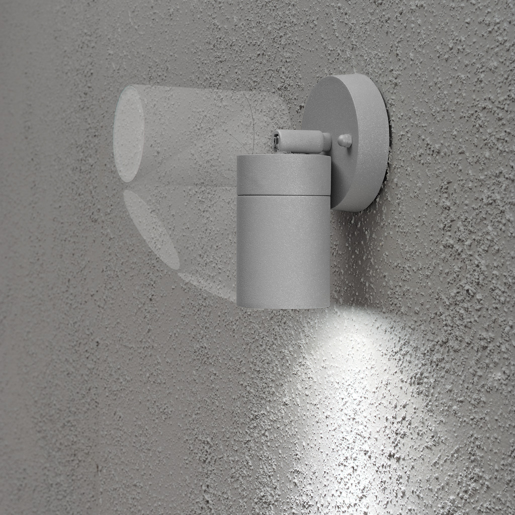 Modena Gris lampe d’extérieur De Konstsmide - La lampe est r&eacute;glable, fournissant une lumi&egrave;re pratique et efficace qui ajoute s&eacute;curit&eacute; et &eacute;l&eacute;gance aux espaces ext&eacute;rieurs.