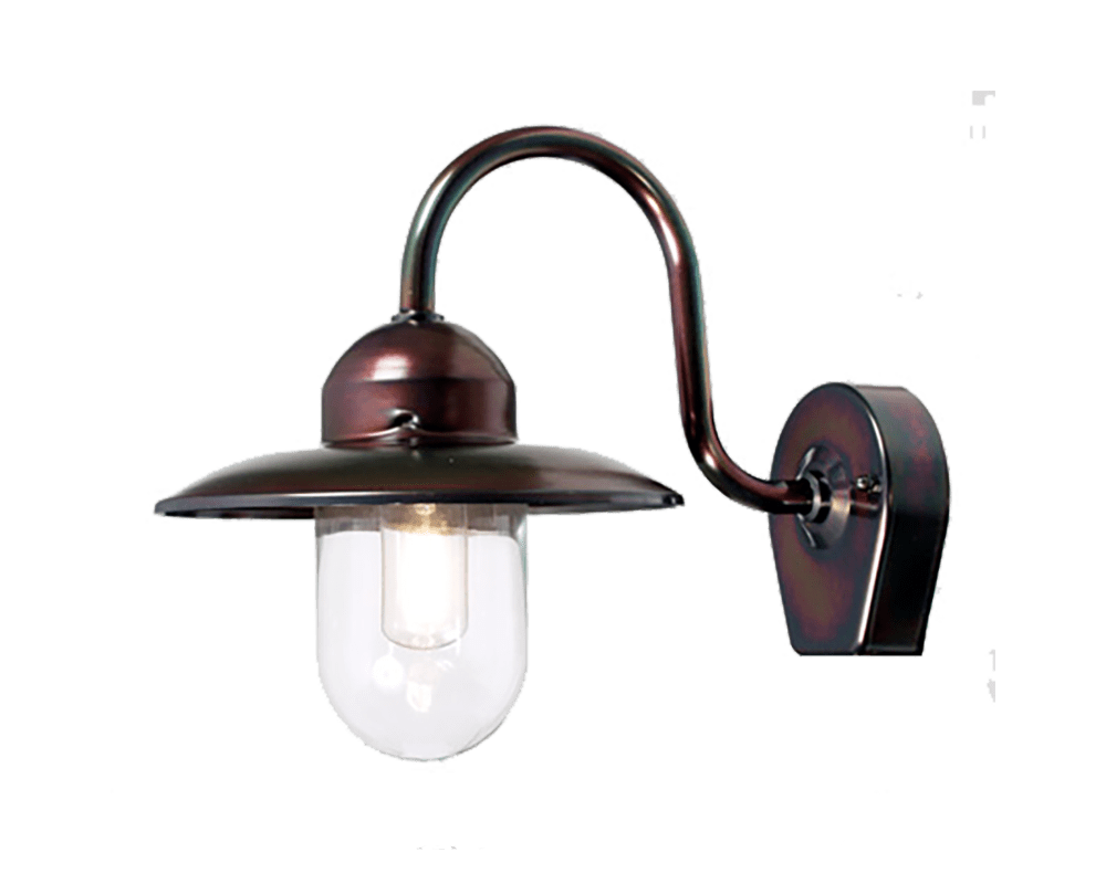 Nisse Cuivre oxydé lampe d’extérieur De Westal - Son abat-jour en verre transparent assure une diffusion optimale de la lumière et crée une ambiance chaleureuse aux entrées, sur les façades ou les terrasses.