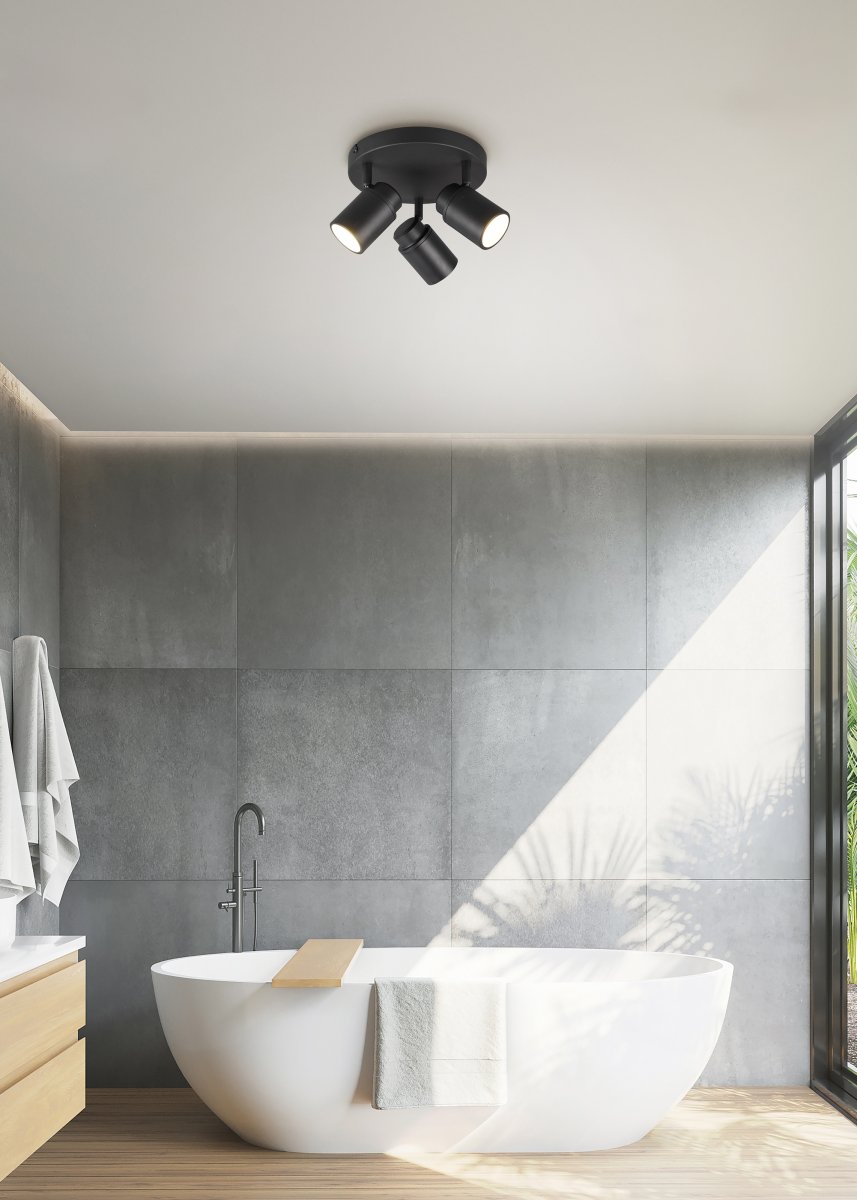 Angelo Ø20 Noir lampe de salle de bain De Trio Lighting - Ce spot classique avec abat-jour réglable en continu et protection IP44 est polyvalent et convient aussi bien à la buanderie qu'à la salle de bain.