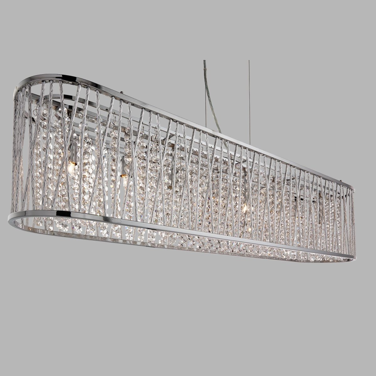 Elise 104cm Chrome suspension De Searchlight - Le centre de la lampe est décoré de gouttes de cristal transparent qui scintillent magnifiquement lorsque la lampe est allumée.