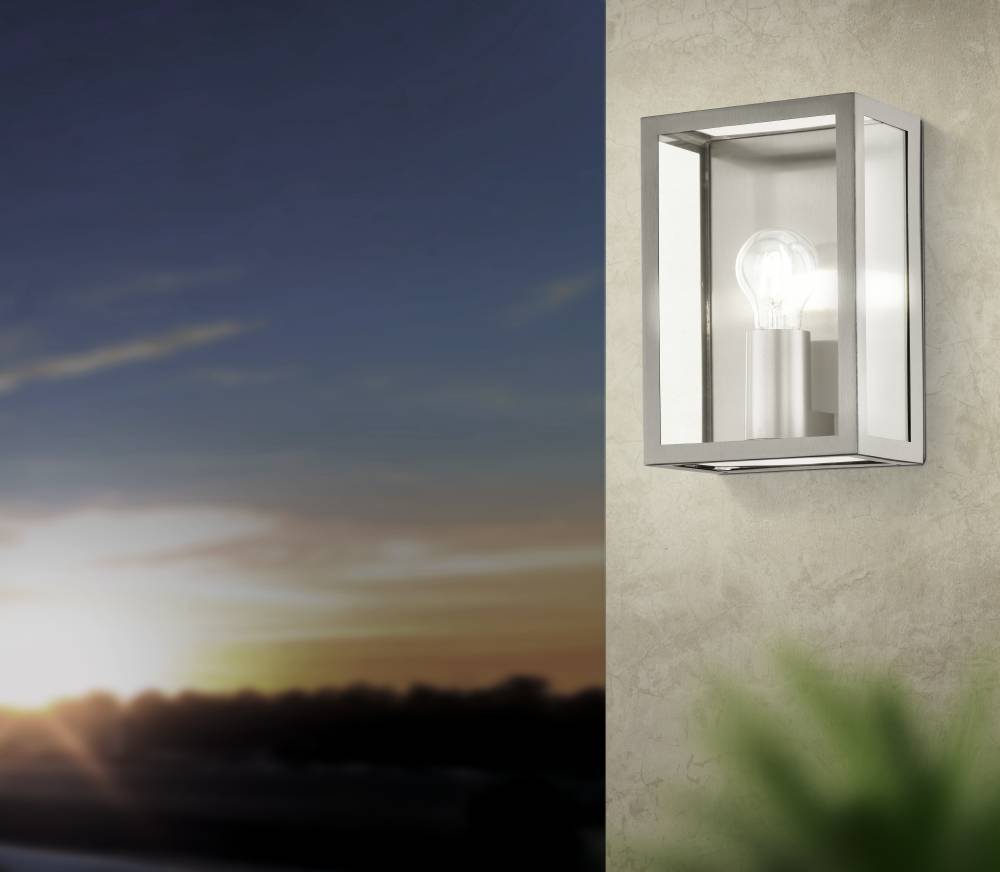 Alamonte Acier inoxydable lampe d’extérieur De Eglo - Le cadre métallique ouvert en acier brossé transmet une sensation industrielle et met en valeur l'ampoule visible, créant une expression élégante.