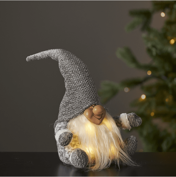 Joylight Père Noël Gris De Star Trading - Gris douillet ; Le Père Noël, dont le corps brille magnifiquement dans une lumière blanche et chaude.