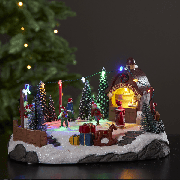 Iceville Multicolore De Star Trading - Placez la patinoire sur une table ou une étagère pour une ambiance festive.