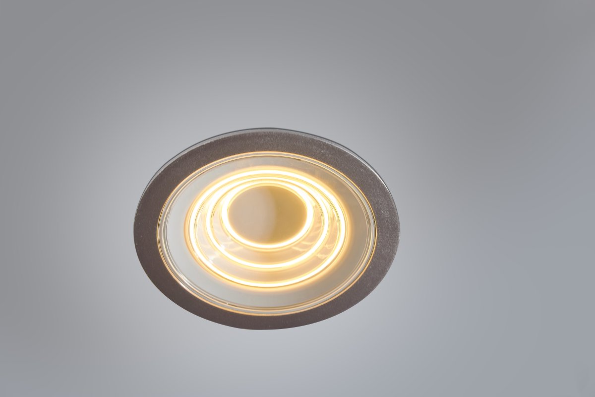 Decor Filament Ripple 9W Aluminium De Ledvance - Dans la premi&egrave;re position, le petit cercle du milieu s'allume, dans la deuxi&egrave;me position, le deuxi&egrave;me cercle s'allume, dans la troisi&egrave;me position, le troisi&egrave;me cercle le plus &agrave; l'ext&eacute;rieur s'allume et dans la quatri&egrave;me position, les trois s'allument en m&ecirc;me temps.
