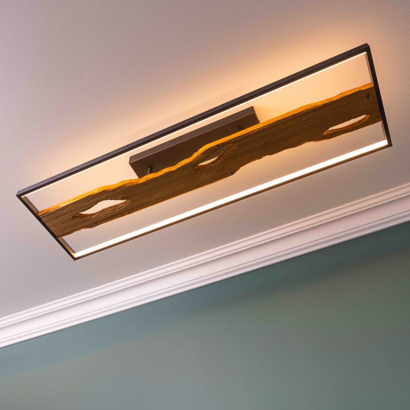Chaumont 100cm Bois plafonnier De Brilliant - Avec une puissance de 48 W et un flux lumineux de 6&nbsp;600 lumens, il offre un &eacute;clairage puissant dans la pi&egrave;ce, tandis que sa lumi&egrave;re blanc chaud de 3&nbsp;000 Kelvin cr&eacute;e une atmosph&egrave;re chaleureuse.