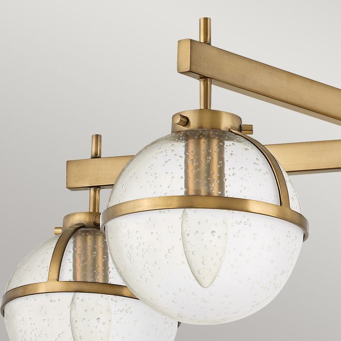 Hollis Ø80 Laiton antique/transparent lampe de salle de bain De Elstead Lighting - Certifié IP44 pour une utilisation dans la salle de bain, il convient également aux autres pièces de la maison.