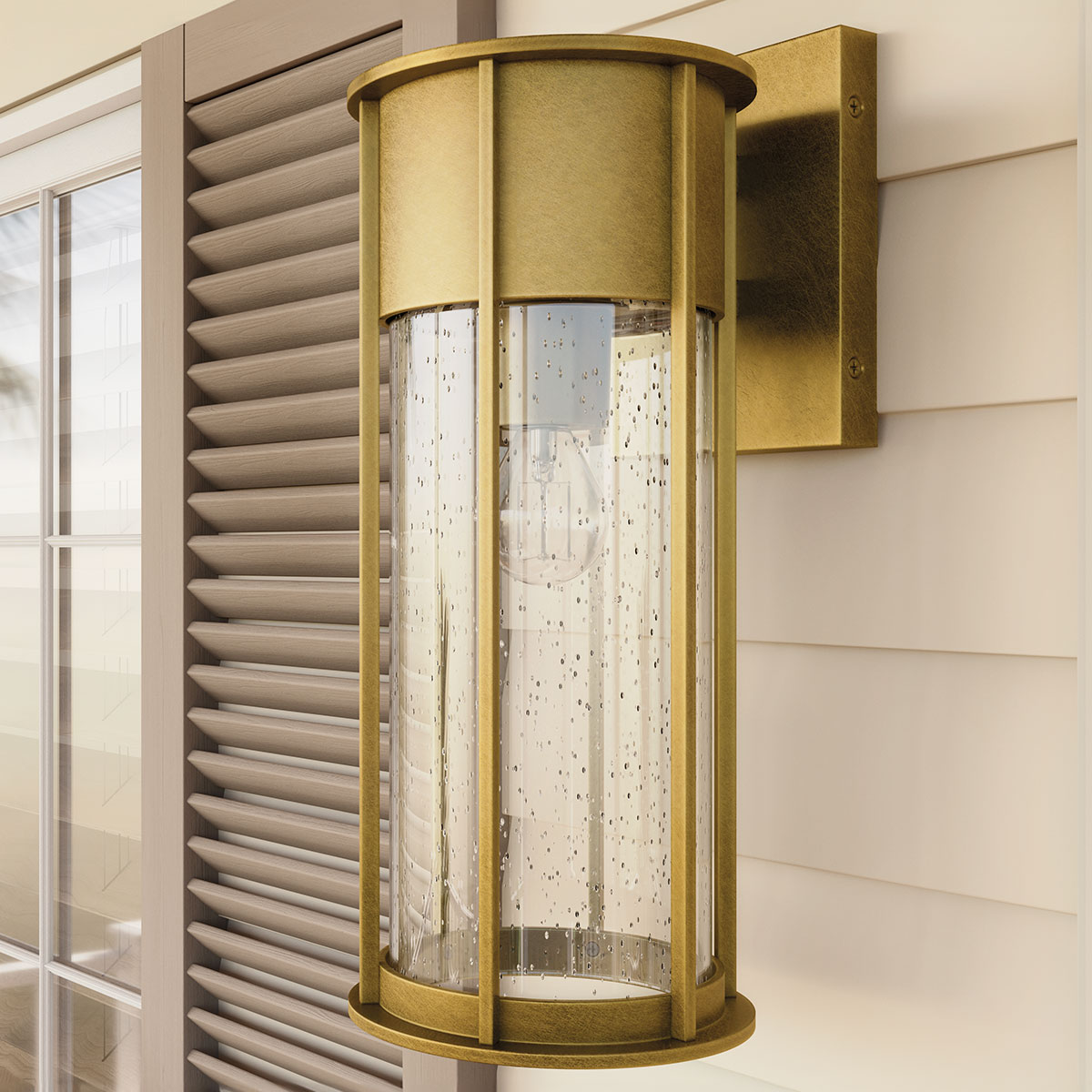 Camillo 37cm Laiton lampe d’extérieur De Elstead Lighting - Med sin robusta metallkonstruktion och klarglas med bubbeleffekt skapar den en vacker ljusspridning som f&ouml;rh&ouml;jer fasader, entr&eacute;er och uteplatser.
