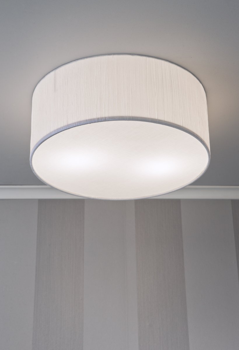 Bendir Ø38 Plissé blanc plafonnier De Aneta Lighting - Avec sa teinte blanche délicatement structurée, il émet une lumière uniforme et agréable qui crée une atmosphère paisible dans la pièce.
