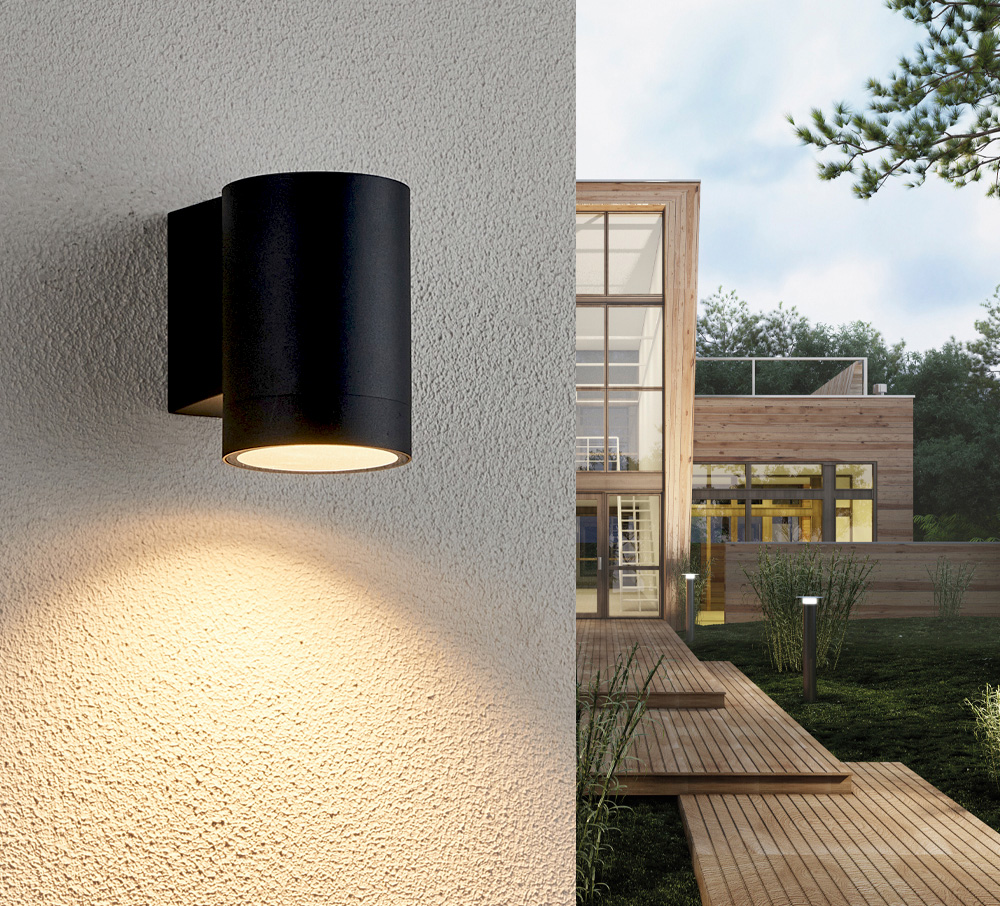 Oden Single Noir lampe d’extérieur De Lampan - Lampan lyser fint ner p&aring; v&auml;ggen och skapar en h&auml;rlig atmosf&auml;r.