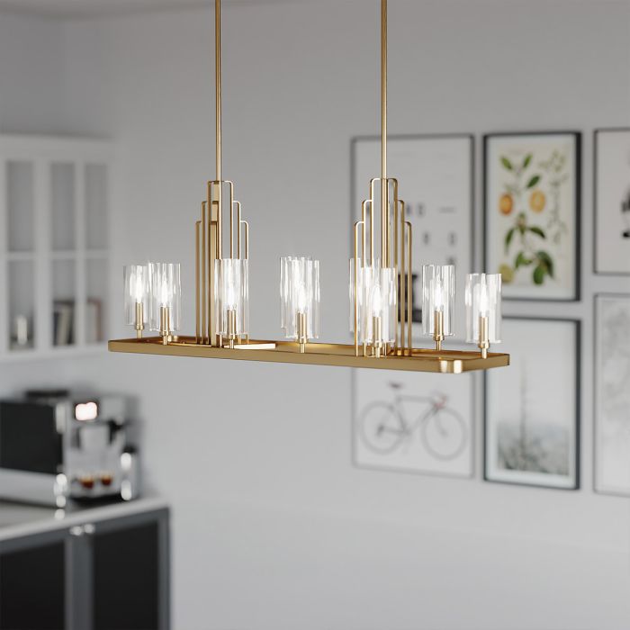 Kimrose 114cm Laiton brossé suspension De Elstead Lighting - Les abat-jour cylindriques en verre sont transparents et présentent des rainures verticales, créant un effet d'éclairage unique et subtil.